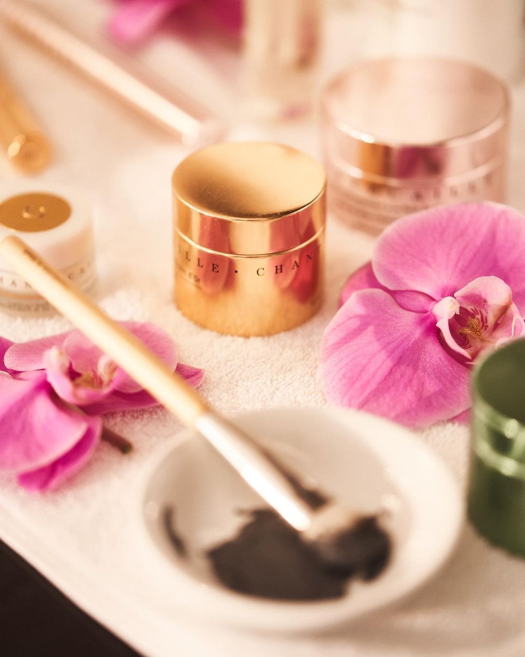 Closeup of face mask product & flowers at Brazilian Court