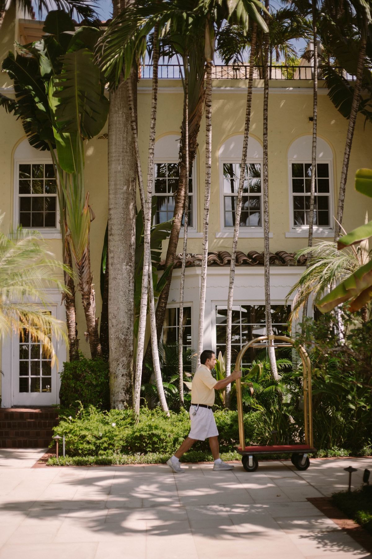 A Bellboy pushing luggage cart at Brazilian Court