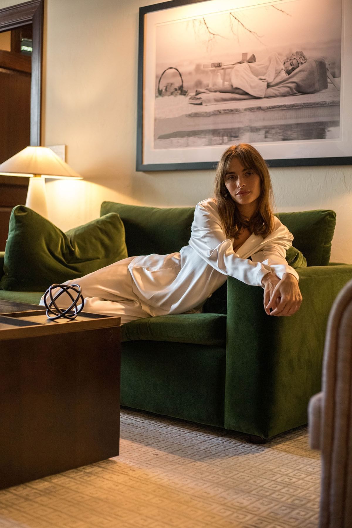 A girl lying on sofa Luxury 3 Bedroom Suite at Brazilian Court