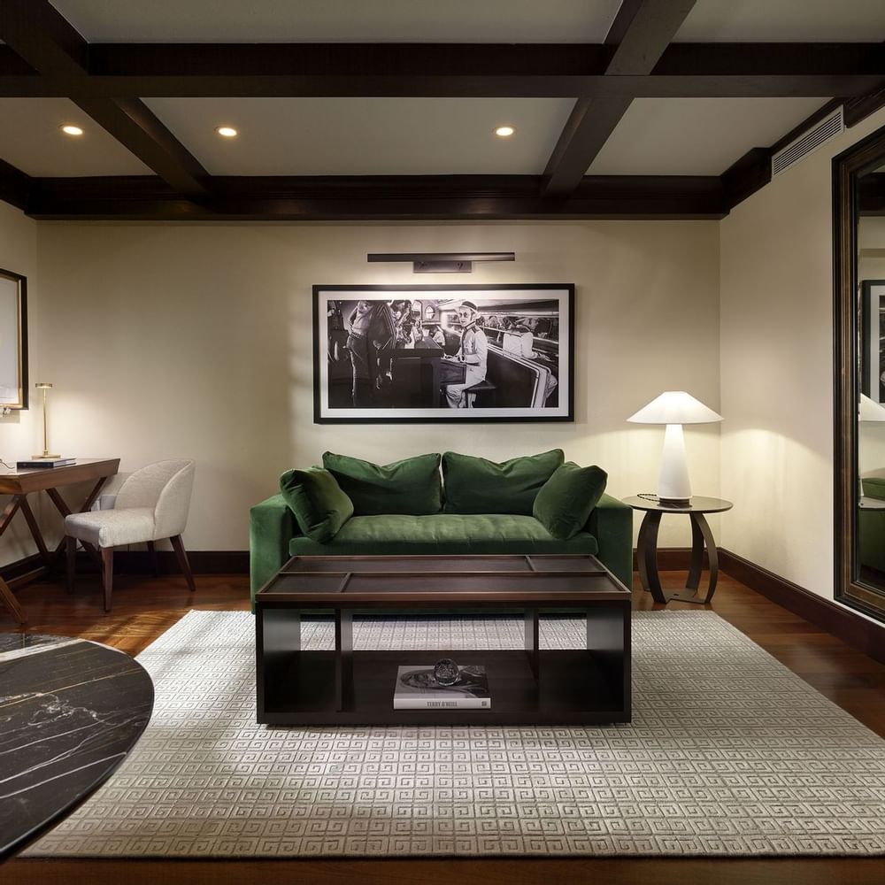 A couple having breakfast on bed at Brazilian Court